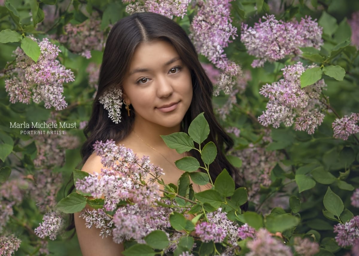 Serene senior picture with purple flowers
