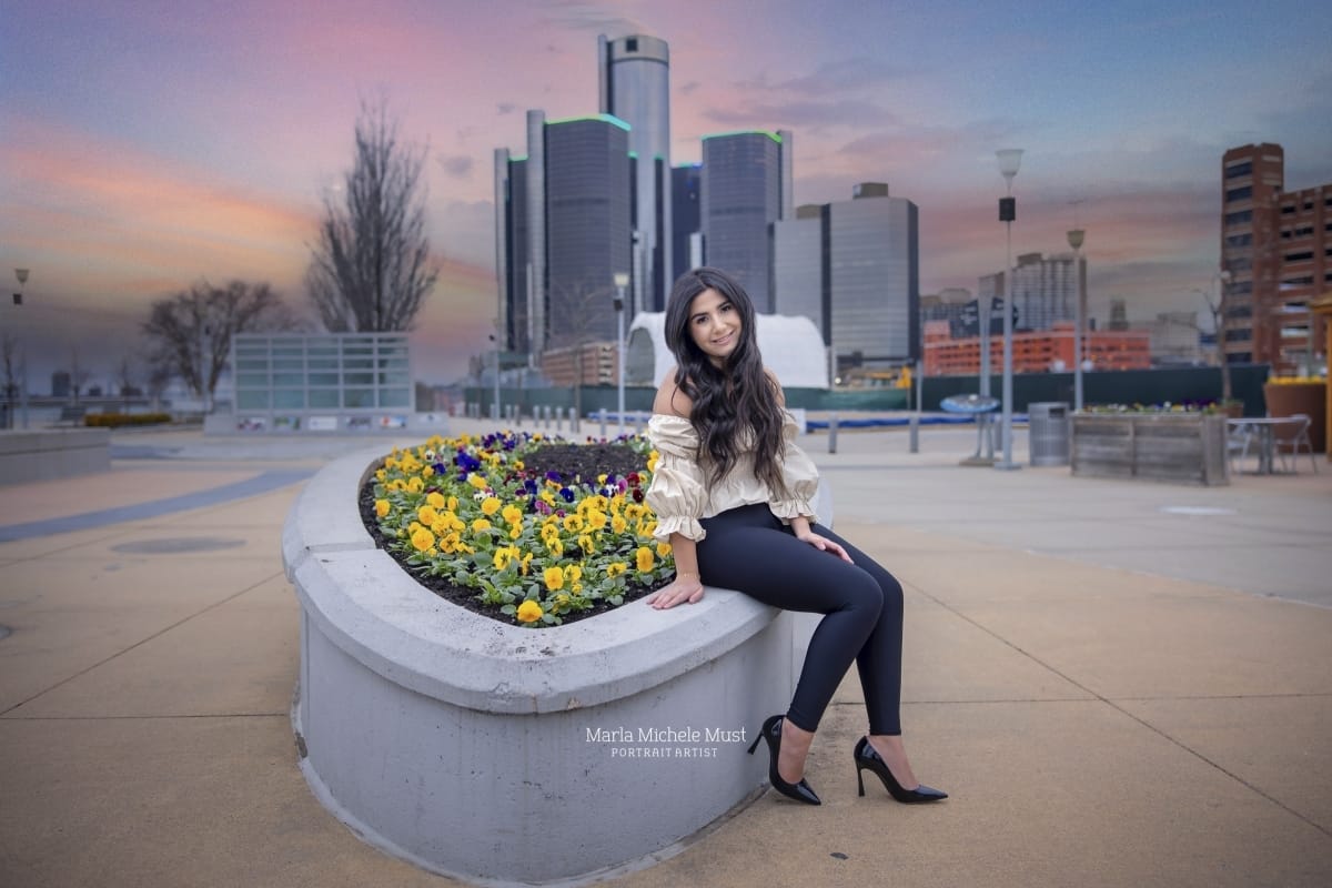 downtown Michigan high school graduate picture with skyline