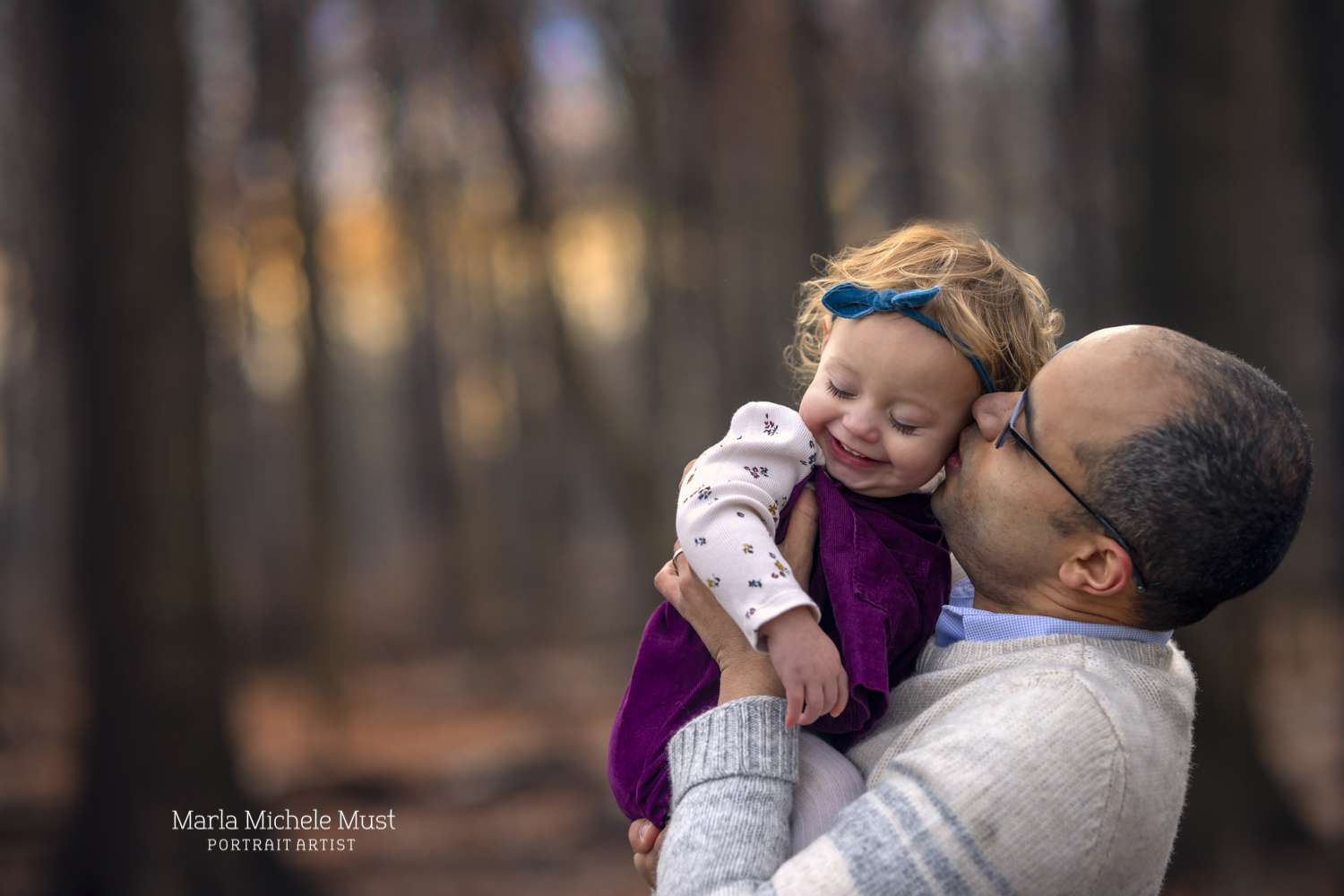 A father daughter photoshoot- A father kissing his daughter on the cheek - taken by local Detroit family photographer.