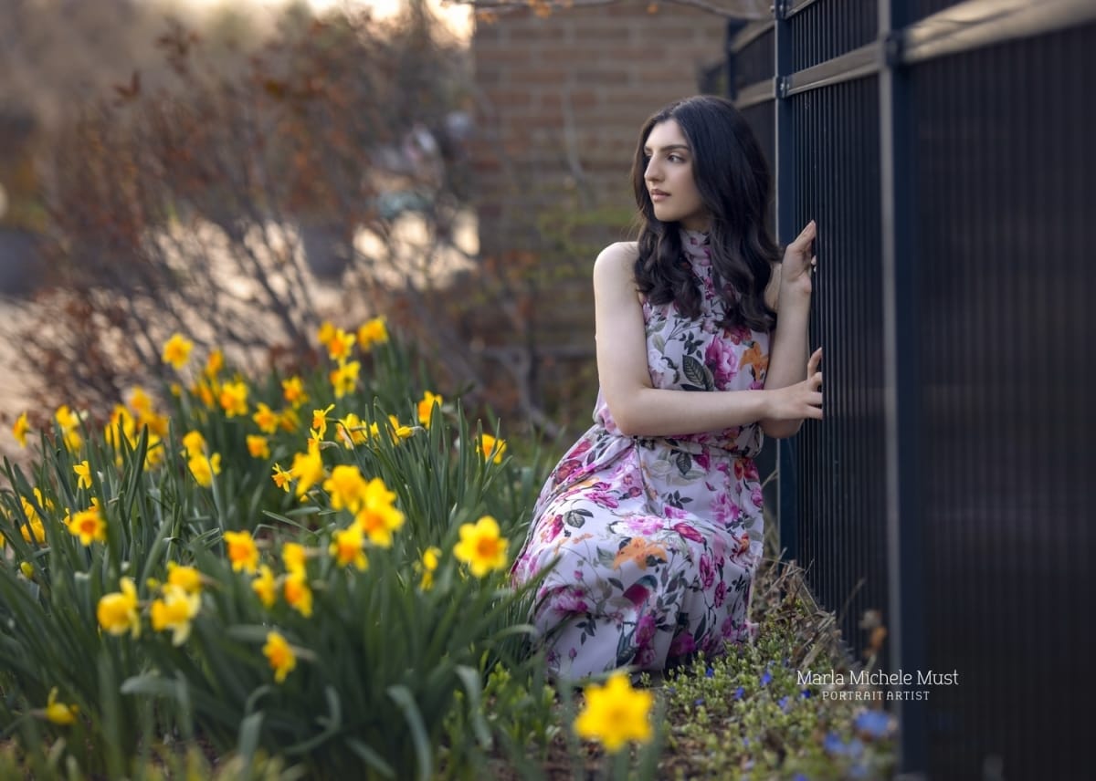 floral themed senior picture with floral dress and yellow flowers