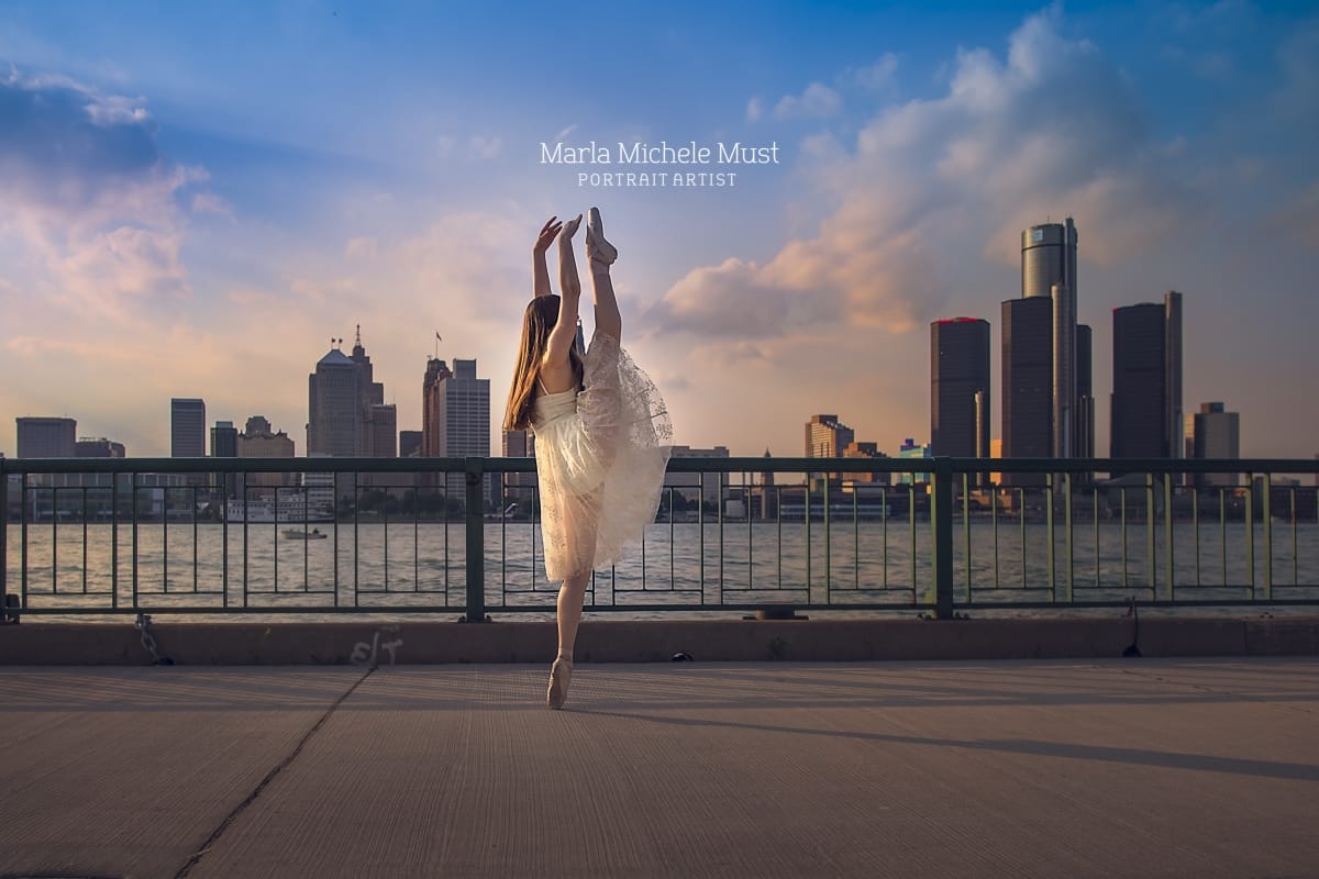 Dancer's lyrical and contemporary pose shines in this stunning dance portrait, captured by a talented Detroit photographer against a city skyline.