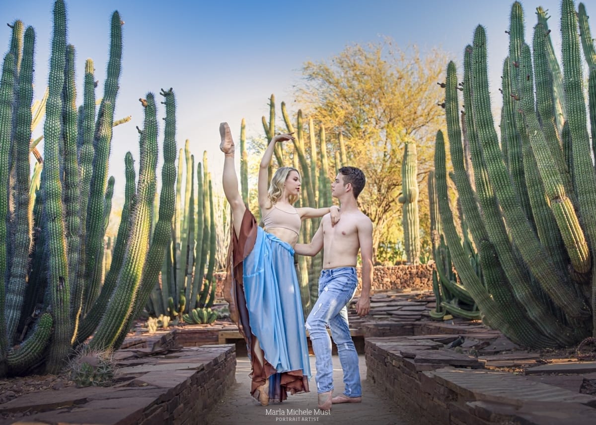 Classically-trained dance partners pose among cacti during a dancer photoshoot captured by a Detroit-based photographer.