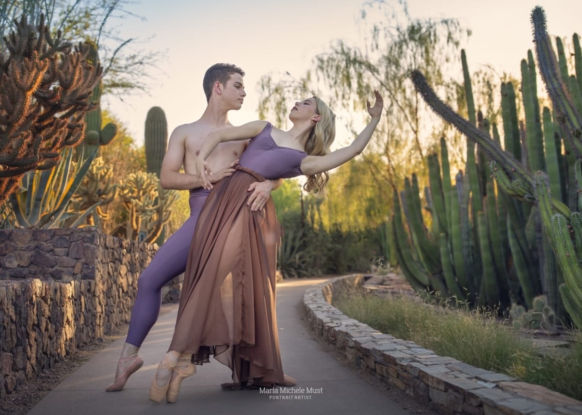Classically-trained dance partners pose among cacti during a dancer photoshoot captured by a Detroit-based photographer.
